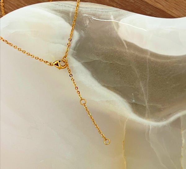 Fleur-de-lis necklace
